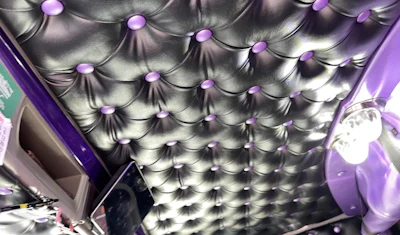 The rig’s interior features Kenworth’s Seattle package with black upholstery and purple button-tuck to match the exterior. Interior lights are glass watermelons with purple LEDs. The dash is also painted purple.