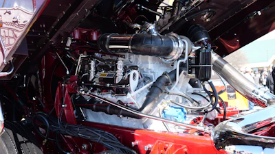 The rig boasts the original V8-power Cat 3408 with an 18-speed and 3.70 rears. Engine complete with white period-correct paint, and the team chromed the valve covers, rocker box, blow-by tubes and the five-inch stacks.