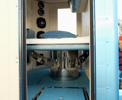 The interior of that sleeper is all custom with speakers, hidden storage, a stainless base for the bed.