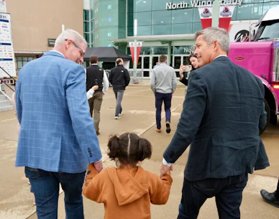 Barrs and Duffy walk hand-in-hand with Dalilah Coleman, the girl whose near-death experience with a non-domiciled CDL driver kicked off a national news story and major legislation.