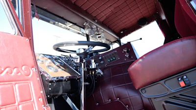All-new interior's made to look factory with the Oxblood Red leather with gold stitching, along with a woodgrain dash.