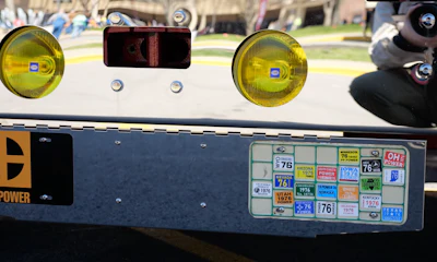 On the front bumper, a “bingo plate” for registration stickers for each state you operated in, long before the International Registration Plan. Luke’s brother, Owen, found a bingo plate from 1976 that still had original stickers on it in good shape; the family bought it and added for old-school symmetry.
