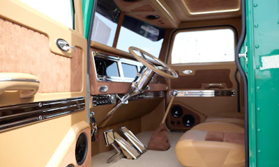 The fully reworked interior features a full-digital dash, HVAC mounted under the dash so it's hidden, and a 12,000-watt stereo.