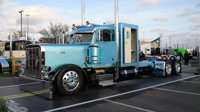 Stegall showed “Blue Collar Roots,” a 2007 Peterbilt 379 powered by a C-15 Cat with a 13-speed on a 295-inch wheelbase.