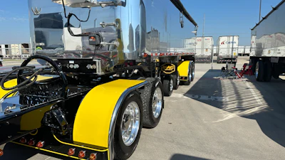 The fenders are painted yellow with black accents, the T-bar the reverse.