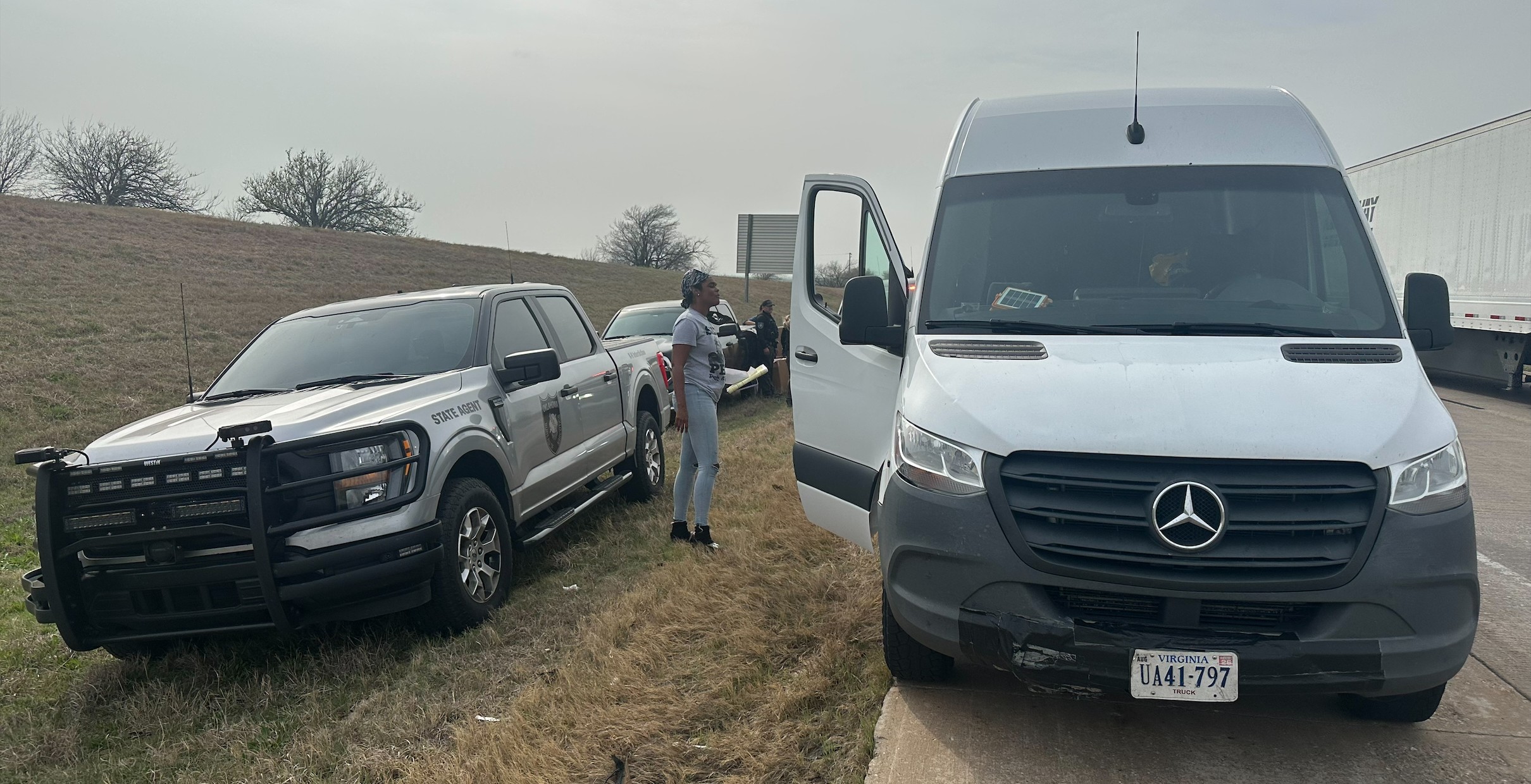 From the roadside the day of the seizure, Smith is shown in communcation with enforcement next to the couple's Sprinter.