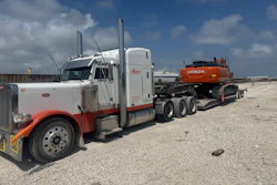 Robert 'Rocket' Miceli hauls heavy and specialized freight with this 2004 Peterbilt 379. This photo was taken when he picked up the Hitachi excavator stolen while his truck was in the shop for an engine repair.