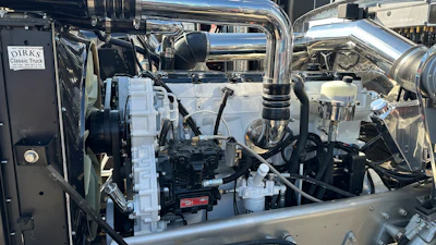 That C16 Cat is now painted white and features plenty of polished parts to make it stand out.