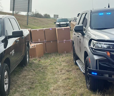 Police would confiscate “15 boxes of marijuana,” or what they considered marijuana per language on the state Bureau of Narcotics release form Smith was made to sign roadside. 'While this is happening,' Smith noted, men not in uniform arrived and loaded the product into the unmarked black pickup you see here. Barnes, meantime, was on the phone with Fide relaying the situation.