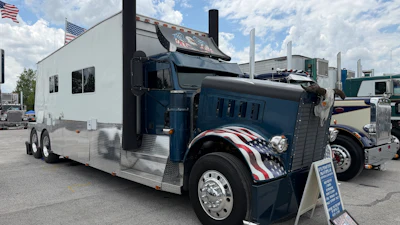This custom 1982 Freightliner FLG was built by Jim Miller into a rolling home away from home, outfitted with a queen size bed, two couches, and all manner of creature comforts.