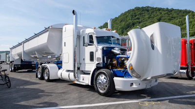 A.J. Dawes is showing his 2009 Peterbilt 386, coupled with a 2026 Superior frameless end dump.