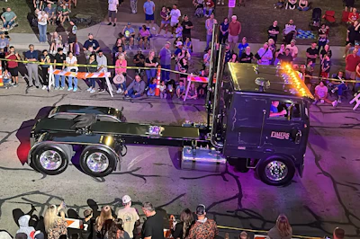 The rig is shown here rolling through downtown Denton during the Peterbilt Pride & Class parade.