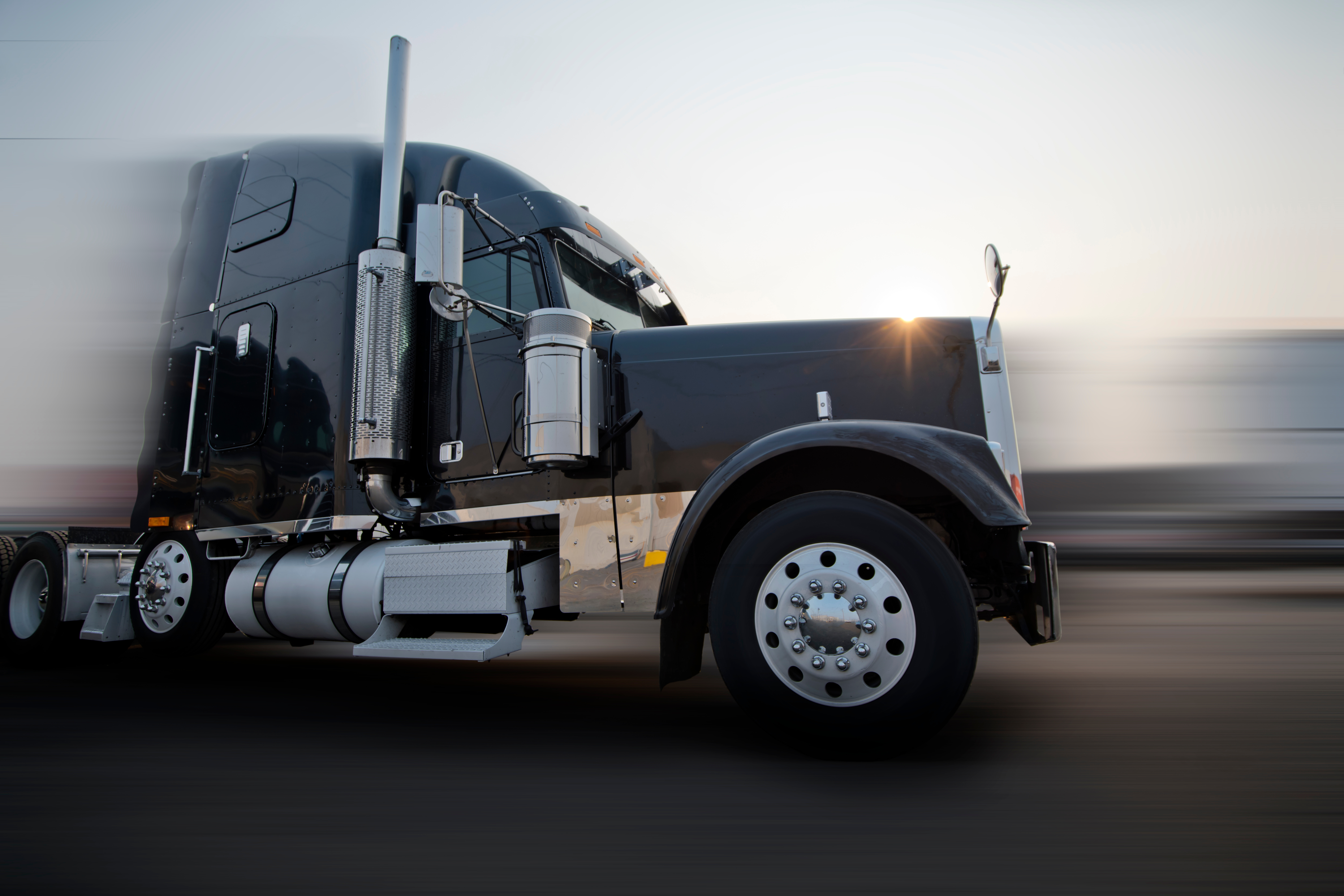 Speeding Truck Highway Adobe Stock 221050794