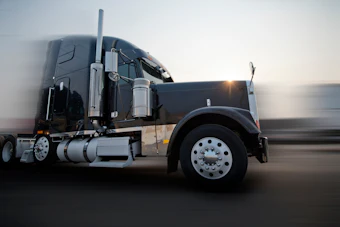 Speeding Truck Highway Adobe Stock 221050794