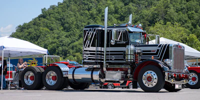 Erin Barrick's 1986 Peterbilt 359: Barrick's a fourth-generation trucker who spent weeks meticulously taping out a completely custom paint scheme to ensure it didn't look like any other rig on the highway. Originally a blue day cab, the heavily customized Pete is now a moving tribute to Erin's grandfather and his legendary 'Black Deuce' sprint car.