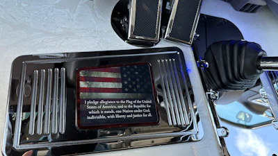 The floor plate features the American flag with the Pledge of Allegiance written out under it.