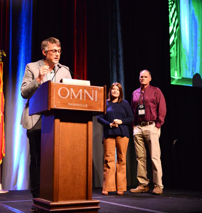 Robbie (right) and Lori Turnage onstage with Overdrive Editor Todd Dills at Small Fleet Champ sponsor NASTC's annual conference in Nashville in 2025. Enter the 2026 competition by July 31 for a chance to be one of four finalists to make the trip to Music City for the NASTC event in late October.