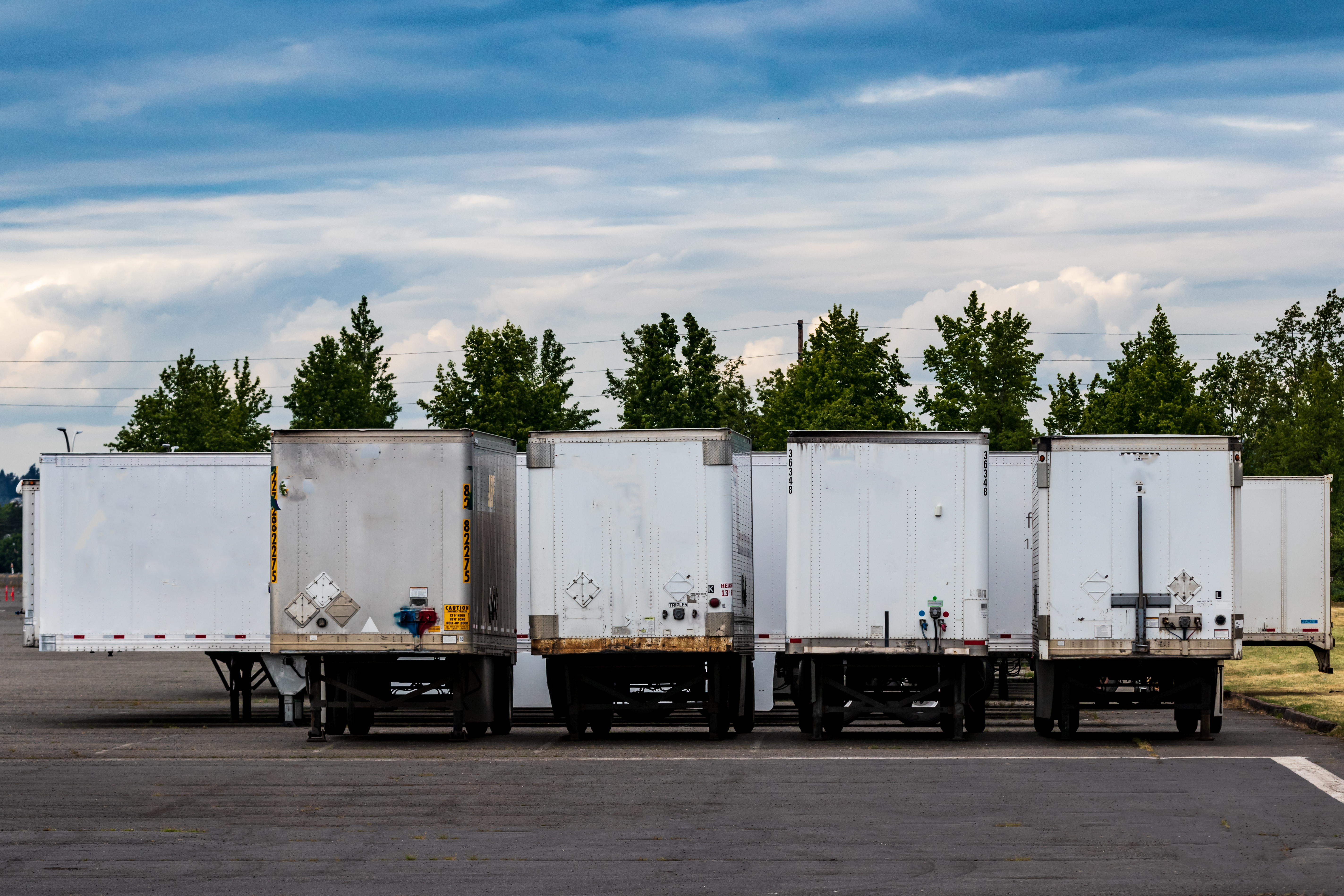Van Trailers Parking Lot Adobe Stock 213551817