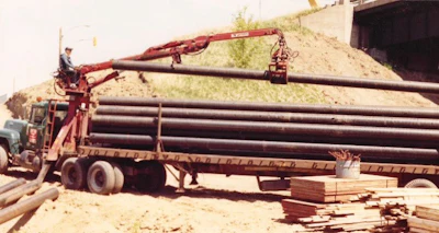Charlie Otto working the unloader in an archival company photo.