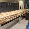 In total, 366 packages of cocaine weighing 1002.13 pounds (454.56 kilograms) were removed from the trailer.