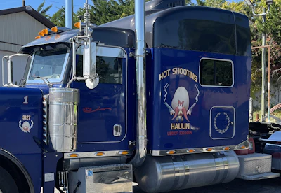 Plenty other folks got a smile out of his company name and insignia on the doors during his first run at a small fleet. 'People loved it,' he said of the Hot Shootin's Haulin logo on the sleeper of his units.
