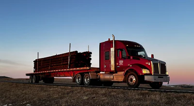 Among Otto Transfer's all-Detroit-D13-powered trucks hauling poles in its specialized operation is this beauty of a Western Star.