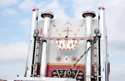 He added “big stacks, you know, the twin breather stacks,” and plenty other “bling” when looking at the back of the cab.