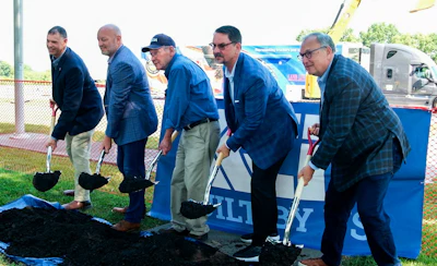 OOIDA's Todd Spencer (center) and MTA's Tom Crawford (to Spencer's right) with reps from Missouri government and contractor KCI, breaking ground on the project.