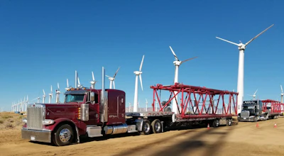 Nine-truck KST logistics moves with step deck and extendable flatbed trailers with a variety of freight on the hook, including loads like these for regional utility customers in their California home base.