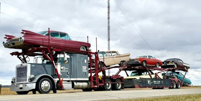 One among many loads -- vintage autos. Nice glamor shot, as company safety man and trainer, former owner-operator Ron Spring, put it.