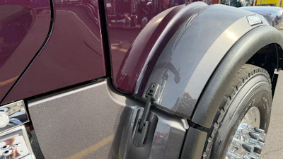 Starting with the paint scheme, Johnson laid on Peterbilt’s Legendary Purple as the primary color with Legendary Gray front fenders, yielding the “Purple Reign” nickname.