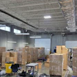 In total, there were 27 pallets of boxes in the trailer containing a total of approximately 5,200 pounds of marijuana, 13,600 pounds of THC products, and 1,000 pounds of psilocybin products.