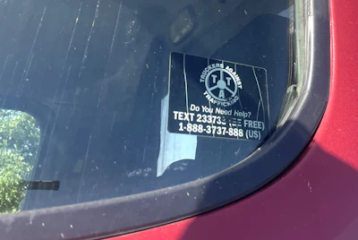 Tat Sticker In Window 2